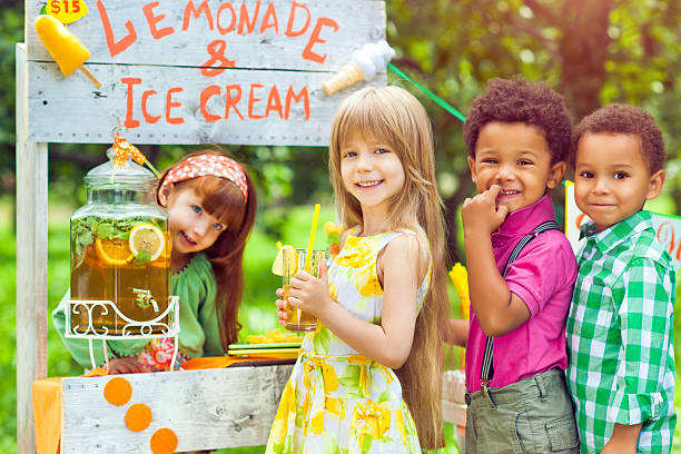 istock Lemonade stand and children 479244295