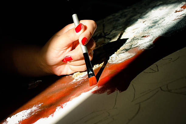 Woman hand painting with brush Woman hand painting with brush creación stock pictures, royalty-free photos & images