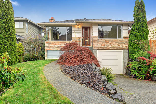 istock Traditional house with small garage and walkway. 479244712