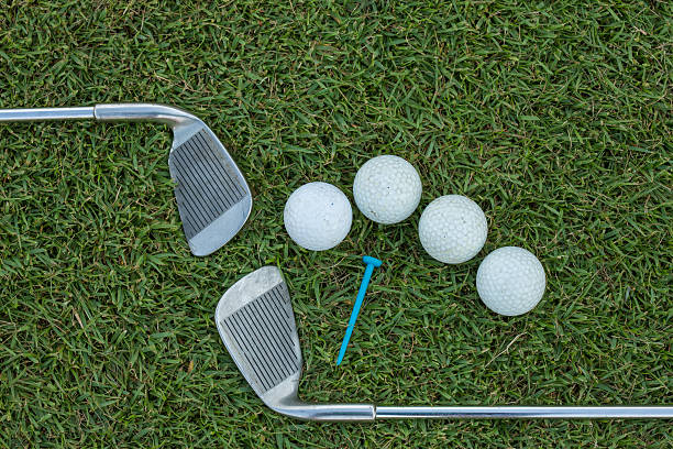 istock Golf Ball and Golf Club on grass 479249694