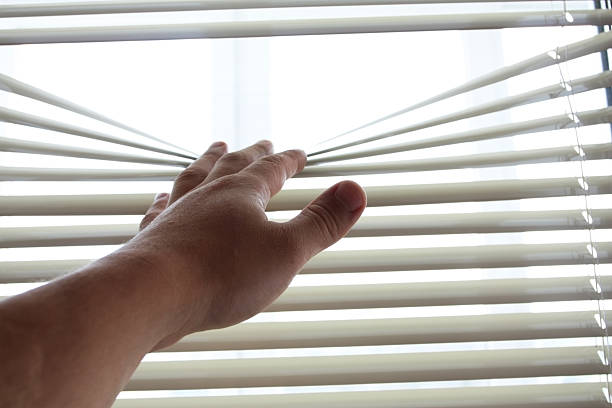 istock Bright sunlight through curtains of blinds 479251212