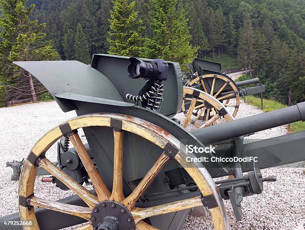 Fantastic Camera Tripod Over An Old World War I Cannon Stock Photo - Download Image Now