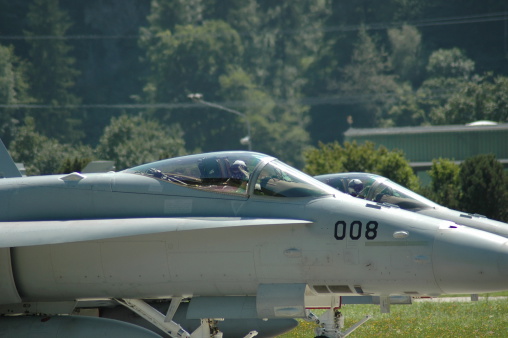 Swiss Airforce pilot is waving 