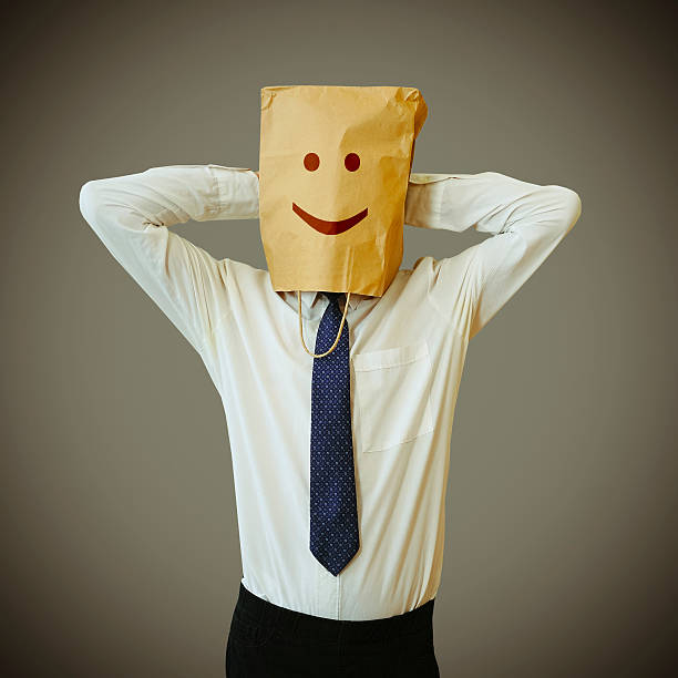 istock Businessman with a paper bag on head 479256716