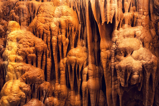 Cave Draperies Karst formations inside of the Balcarka Cave (Moravia, Czech Republic). stalagmite stock pictures, royalty-free photos & images