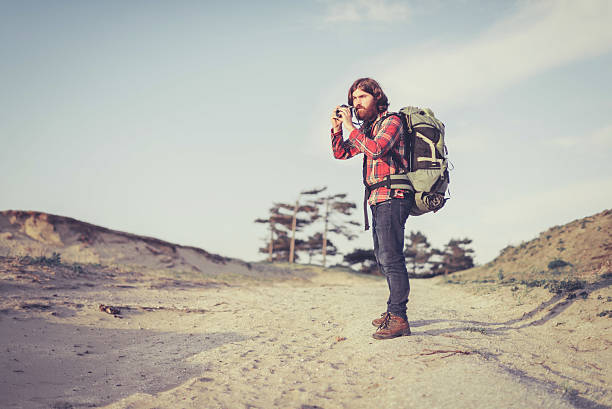 istock Photographer standing on a sandy trail 479257644