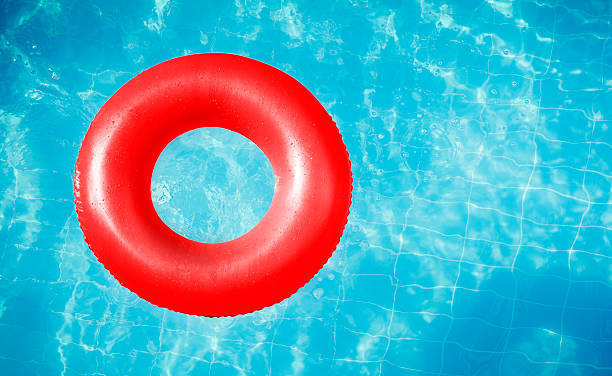 плавательный бассейн - inflatable floating on water life belt equipment стоковые фото и изображения