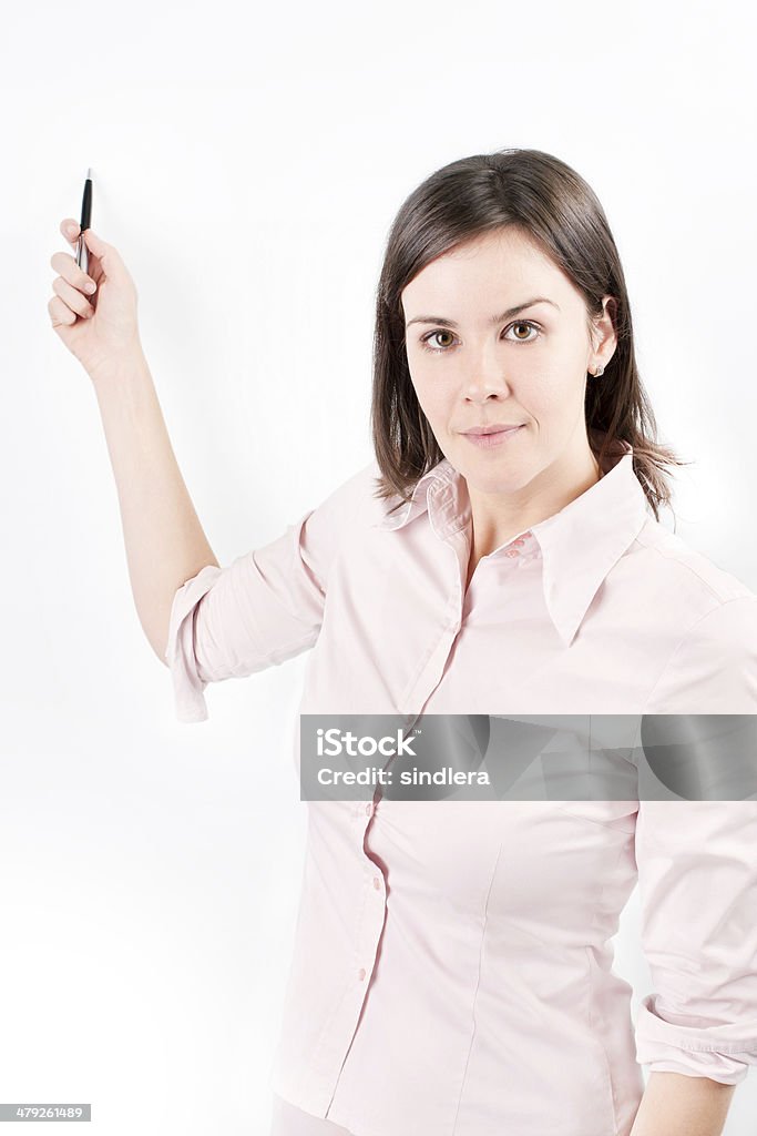 Beautiful business woman during a presentation. Beautiful business woman during a presentation Adult Stock Photo