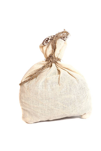 istock Tied with rope sack bag isolated on white 479262898