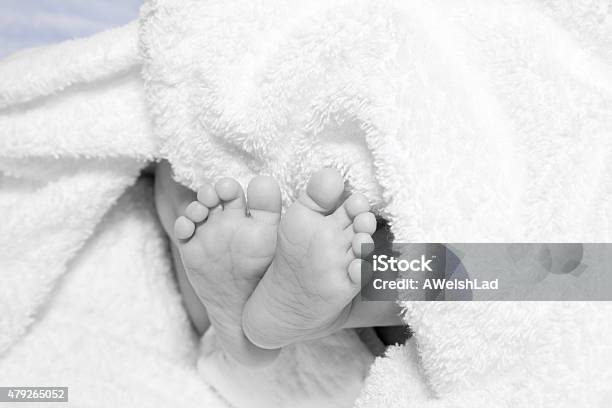 Newborn Babys Feet And Bottom End Stock Photo - Download Image Now - 2015, Ankle, Baby - Human Age