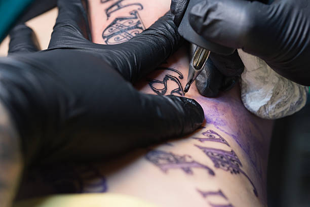 istock Girl Getting Tattoo 479267482