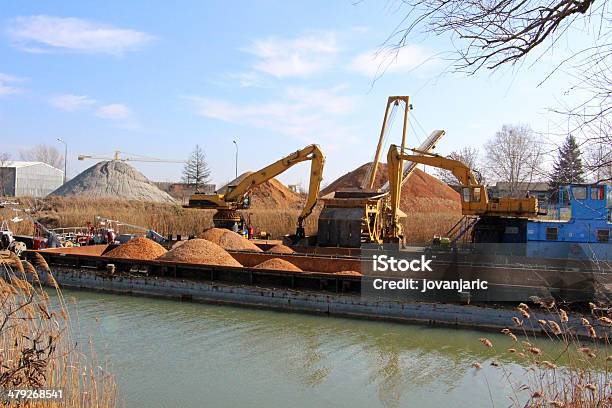 River Port For Loading Of Construction Materials Stock Photo - Download Image Now - Backhoe, Bulldozer, Business