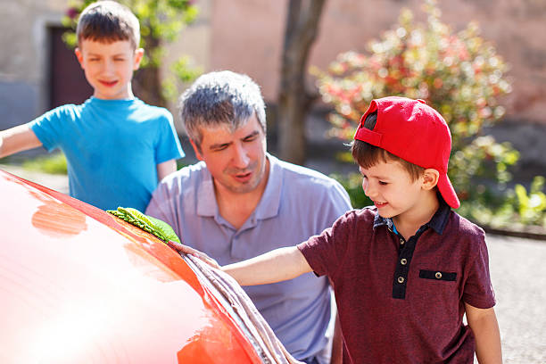istock Caucasian family washing car 479268968