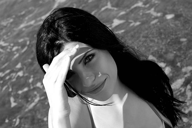 istock Woman hiding from sun black and white 479269115