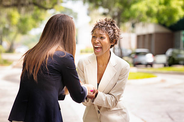 istock African American office worker is ecstatic after hearing good news 479271890