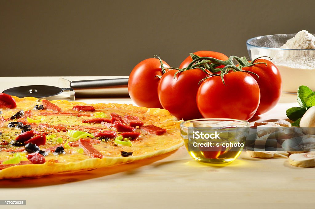Pizza with Pizza Ingredients (Click for more) Pizza with Pizza Ingredients Cooked Stock Photo