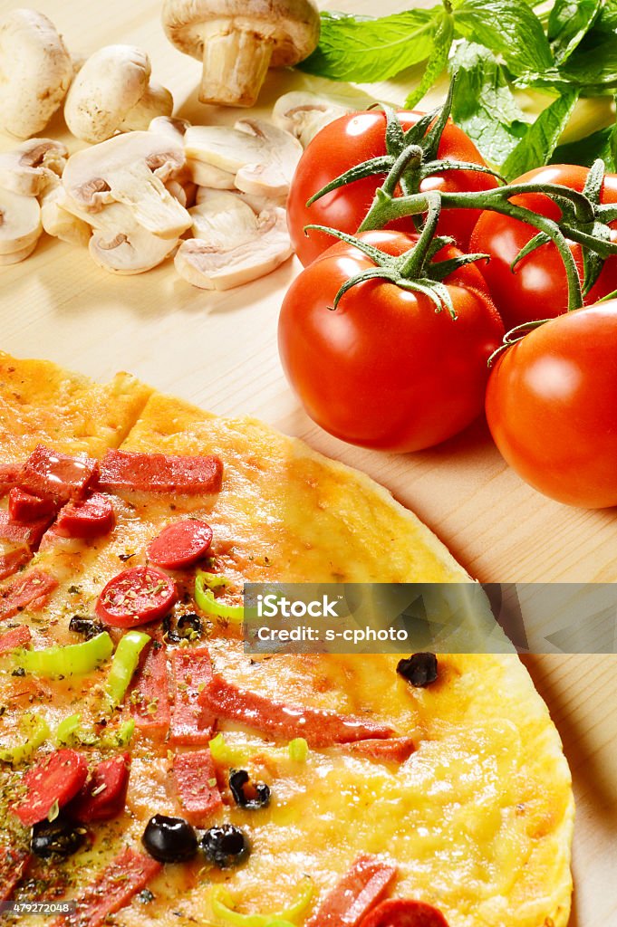 Pizza with Pizza Ingredients (Click for more) Pizza with Pizza Ingredients Cooked Stock Photo