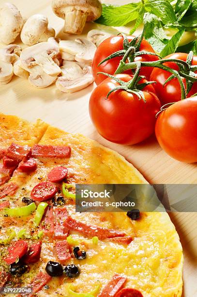 Pizza With Pizza Ingredients Stock Photo - Download Image Now - Cooked, Cooking, Copy Space