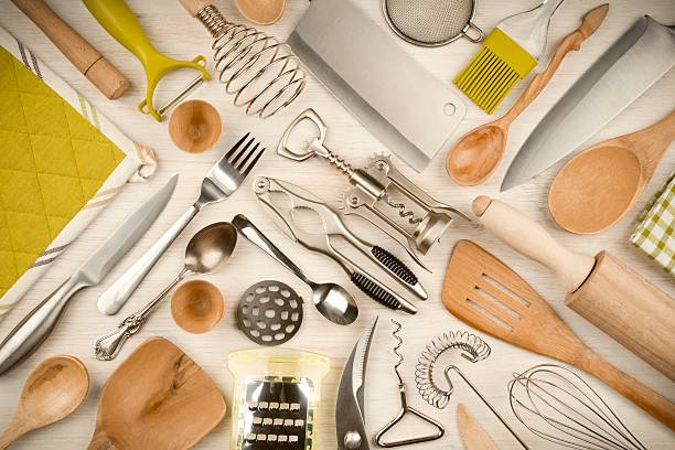 istock Kitchen utensils set on wooden texture background 479272120