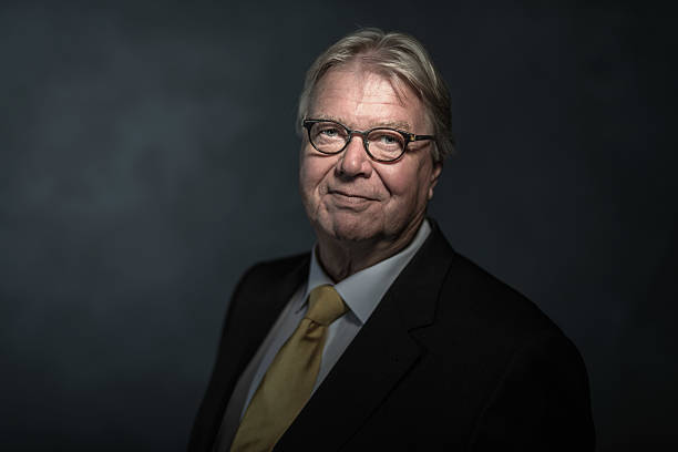 istock Senior businessman on dark background 479272748
