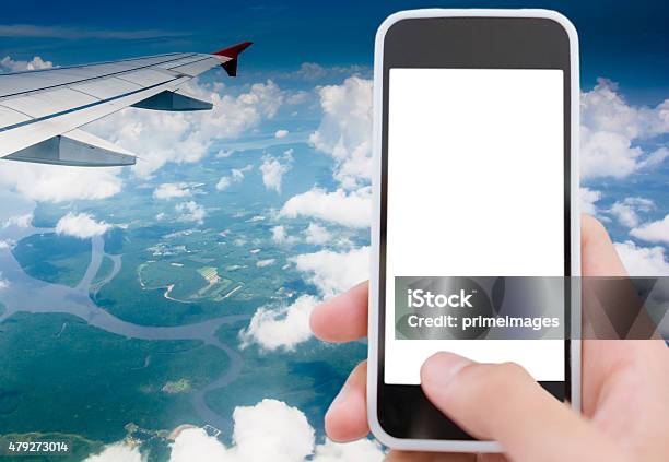 Traveller Using Smart Phone Stock Photo - Download Image Now - 2015, Above, Aerial View