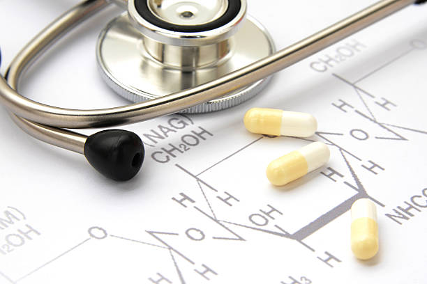 istock Medical concepts, capsules on chemical formula 479273966