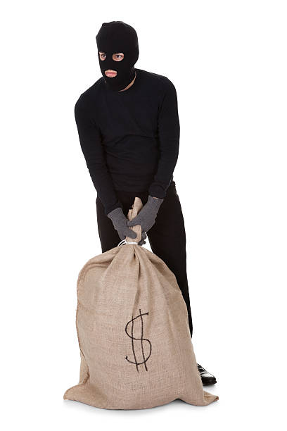 istock Thief with a large bag of money 479281572