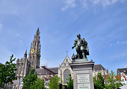 Statue of Rubens with Cathedral of Our Lady in background at Groenplaats, the Central Square of Antwerp, Belgium.