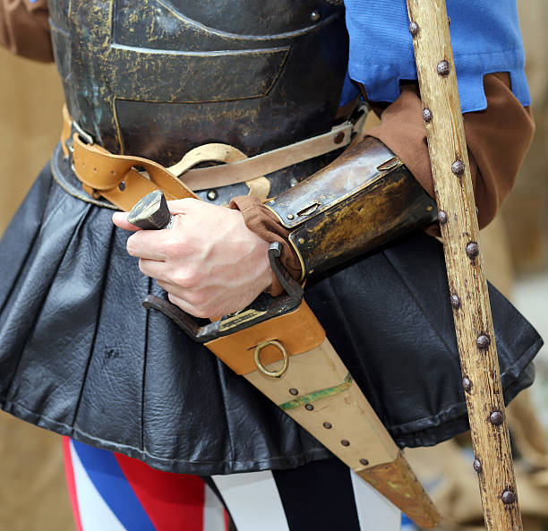 istock medieval soldier with his hand on the knife 479286718