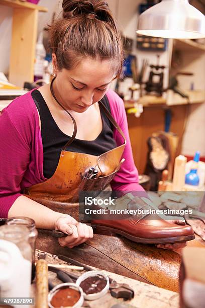 Woman Shoemaker Making Shoes In A Workshop Stock Photo - Download Image Now - 2015, 30-39 Years, Accuracy