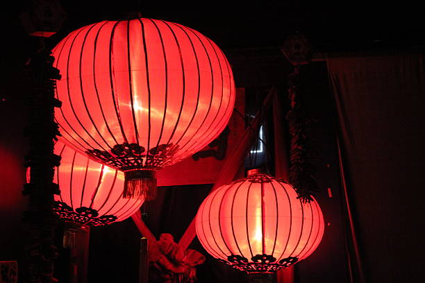 istock Red and Orange Chinese Lanterns Lit up In the Dark 479288439