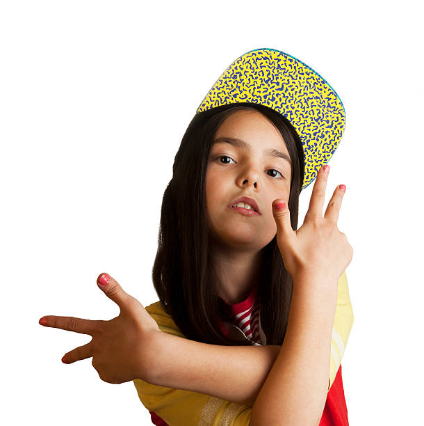 Rapper girl Rapper girl with swag cap isolated on a white background with clipping path rap kid stock pictures, royalty-free photos & images