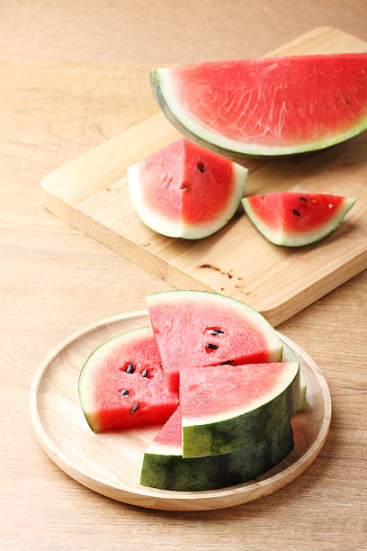 istock fresh watermelon on wooden background 479289672