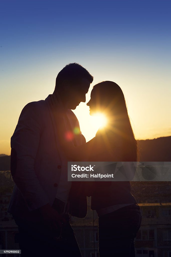 Beautiful young couple Beautiful young couple drinking wine on a terrace of a bar 20-29 Years Stock Photo