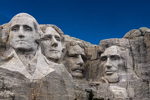Mount Rushmore, Taken from entrance sidewalk. One of the most famous travel destinations in South Dakota. mt rushmore national monument stock pictures, royalty-free photos & images