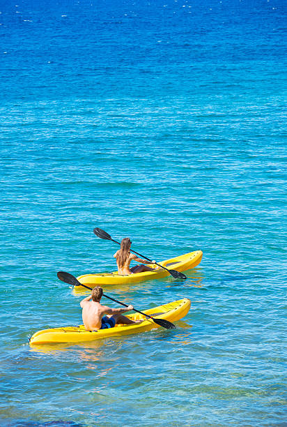 istock Man and Woman Kayaking in the Ocean 479293802