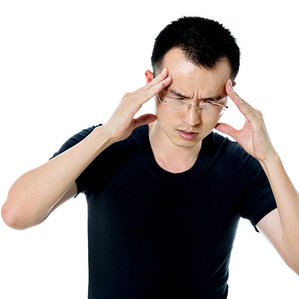 istock Young asian man suffering from headache 479298992