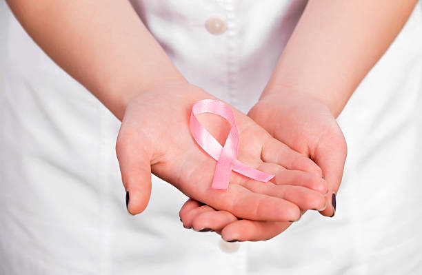 istock doctor with pink  ribbon 479303240