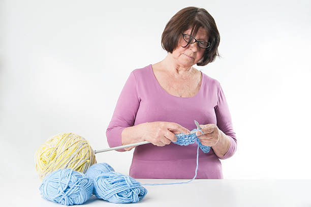 istock Elderly woman knits. 479305106