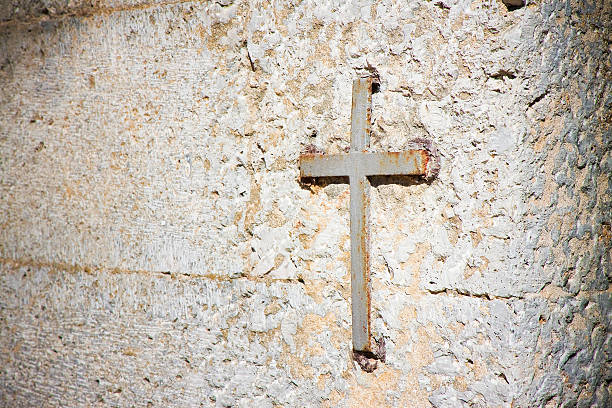 istock Iron cross snuggled in stone 479305358