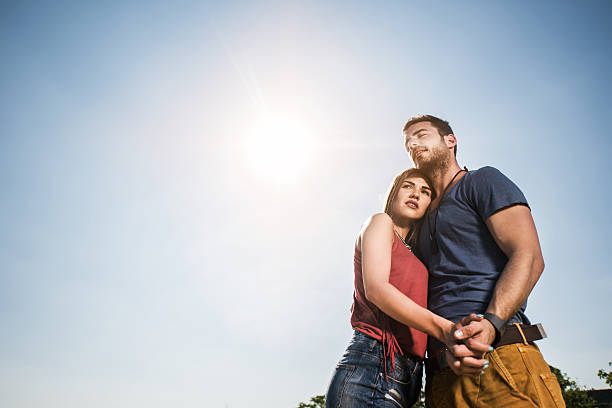 istock Young loving couple against the sky. Copy space. 479306048