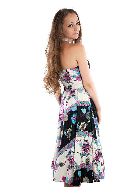 istock Smiling cute woman looking at camera over shoulder 479306102