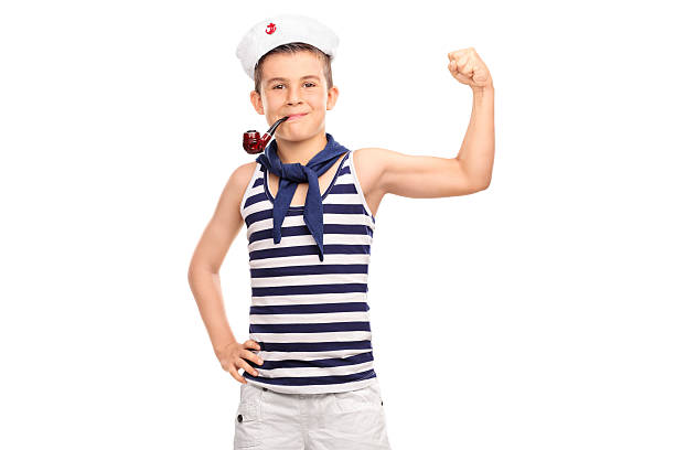 小さなお子様用にセーラー装いをお待ちしている - flexing muscles child little boys bicep ストックフォトと画像