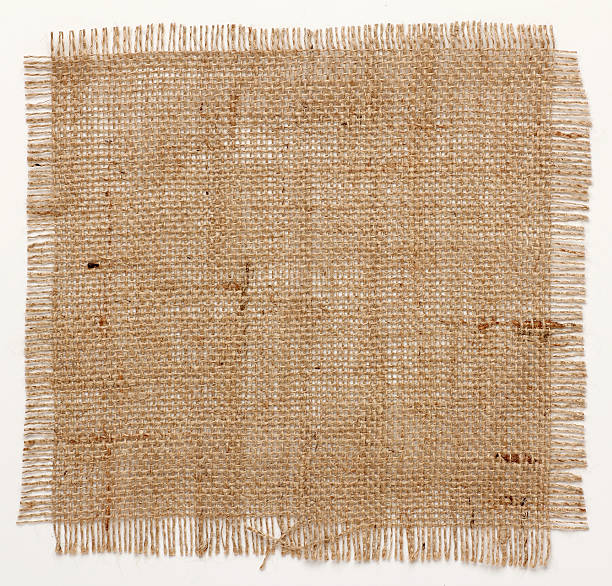 texture of Burlap hessian square with frayed edges