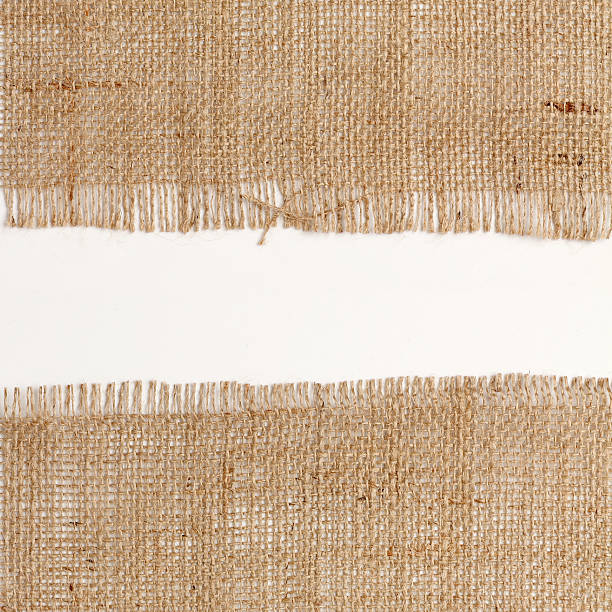 istock texture of Burlap hessian square with frayed 479310318