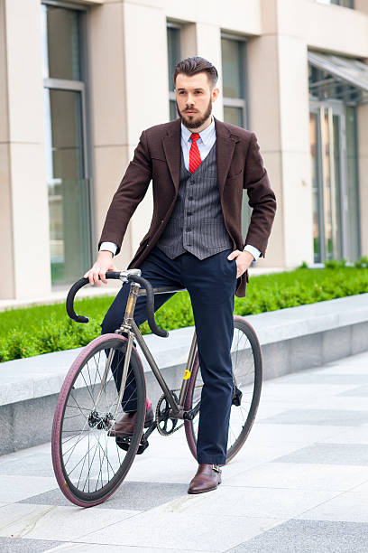 istock Handsome businessman and his bicycle 479311502