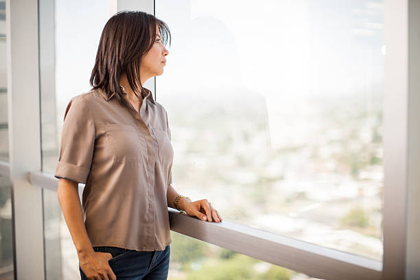 istock Latin woman relaxing in an office 479312052