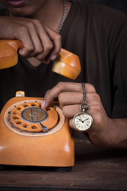 istock man holding up the phone 479313213