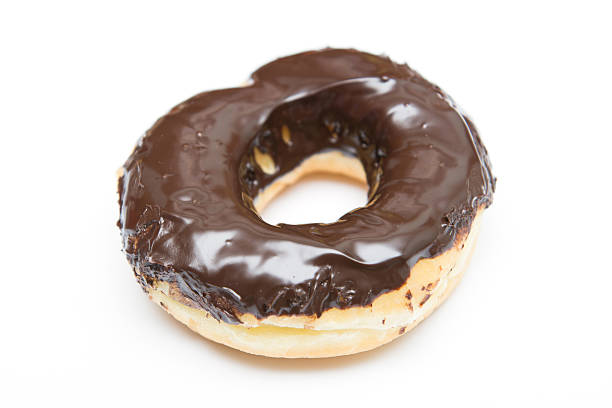 istock delicious chocolate doughnut on white background 479314198