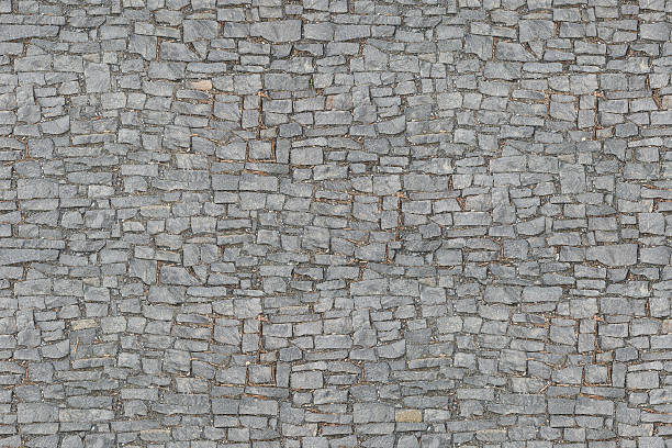 perfectamente calle road textura de azulejos - cobblestone fotografías e imágenes de stock
